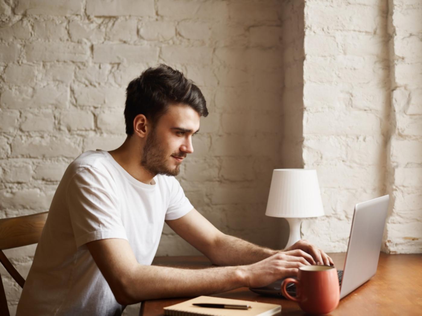 Person reviewing financial statements and receipts
